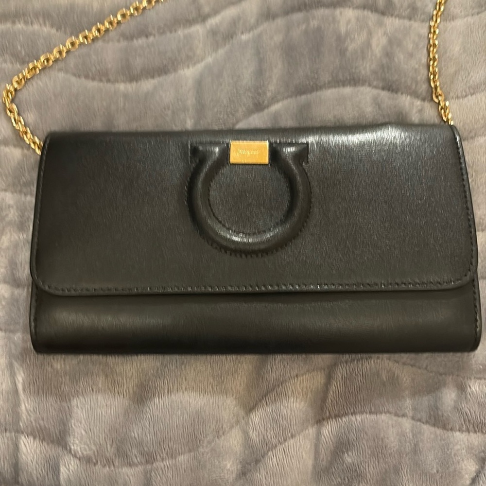 Authentic Salvatore Ferragamo Black Leather Clutch with Gancini Detail